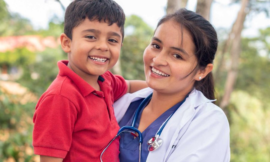 portrait-of-a-happy-child-being-held-by-his-pediat-2023-11-27-05-30-31-utc